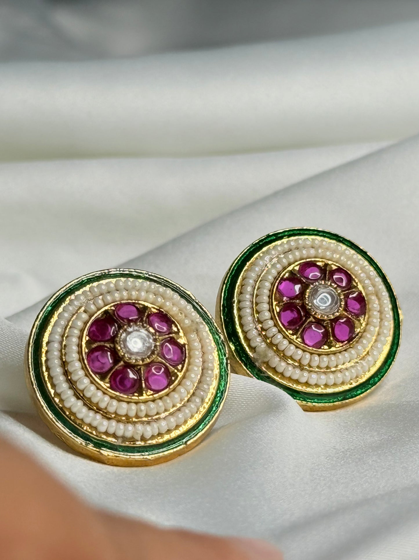 Ruby green swirl earrings